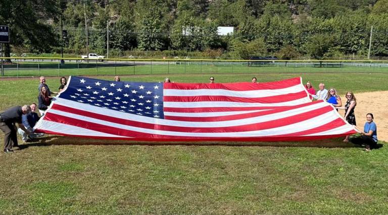 The flag will be displayed on the school dsitrict’s main campus.